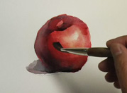 Free watercolor lesson of painting a red apple step-by-step